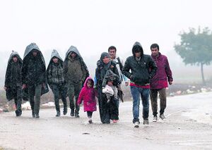 Syria Bootless Woman with children and men.jpg